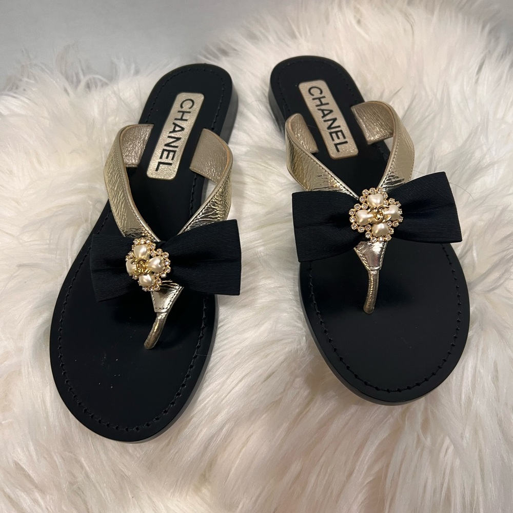Chanel Elegant Black and Gold Sandals